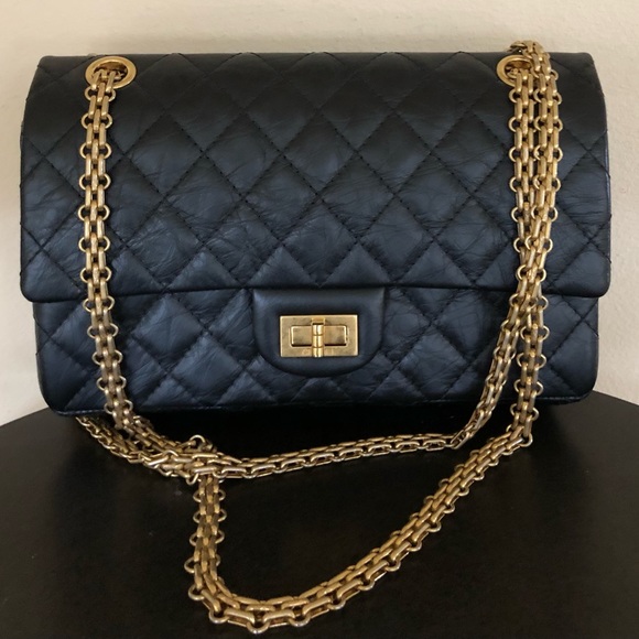 CHANEL Handbags - Classic and iconic Chanel reissue 2.55 in black calf leather. Like new condition